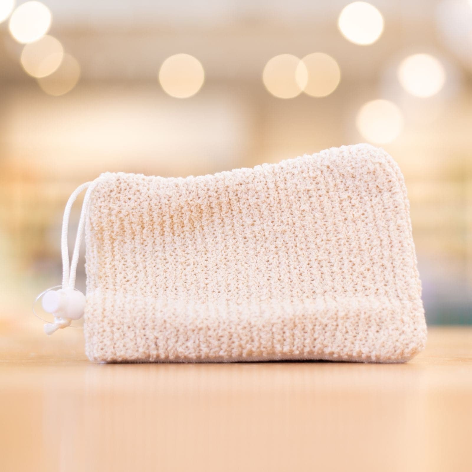 Tan Fabric Soap Sleeve on counter